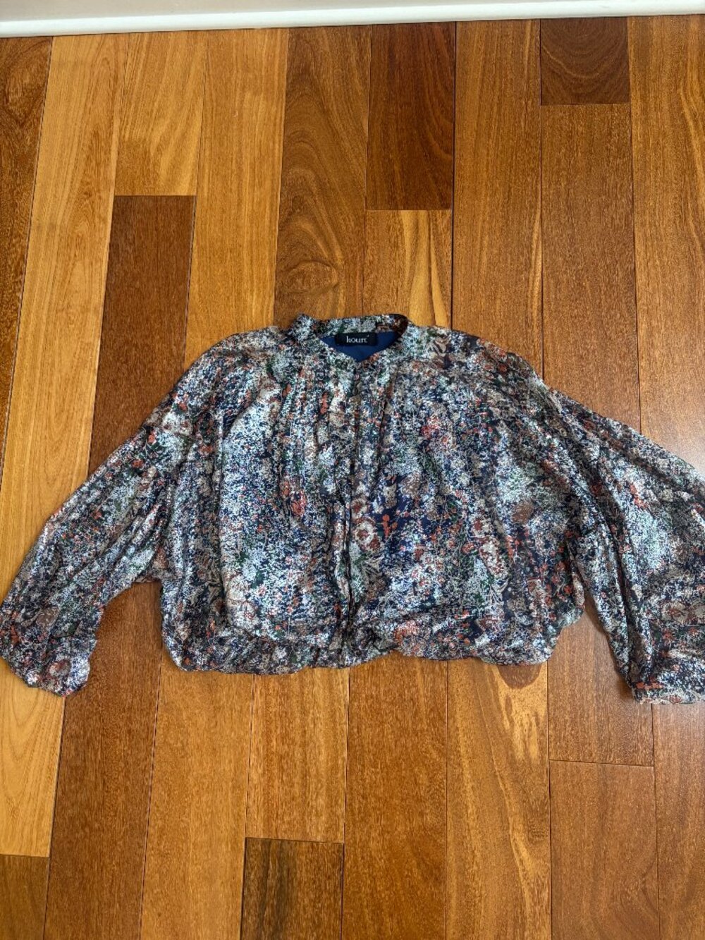 Kourt Silver, Navy orange and green floral collarless button smocked top